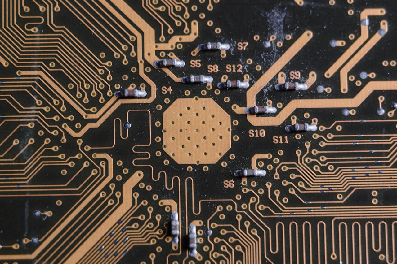 Detailed image of a printed circuit board highlighting electronic pathways and components.